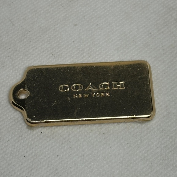 Coach Handbags - Coach Gold Metal Bag Tag – 2” x 1” Brand New
